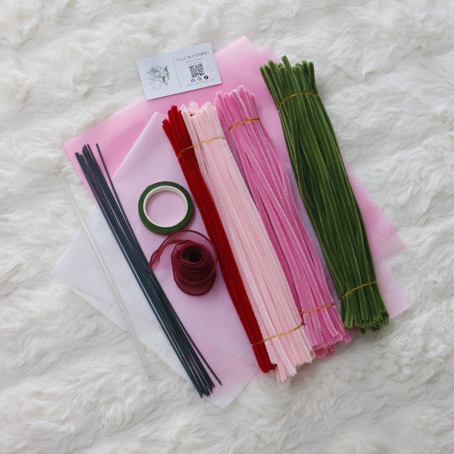 Sweety Roses DIY bouquet made from pink and red pipe cleaner roses with heart-shaped detail. Wrapped in sheer white and pink, finished with a red organza ribbon a handmade floral gift for love and celebration.