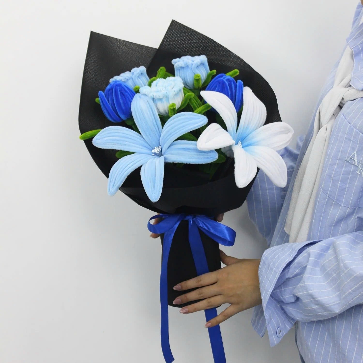 Bluence DIY bouquet with handmade blue, white, and light blue lilies crafted from pipe cleaners. Wrapped in sleek black paper with a royal blue ribbon, this elegant DIY floral kit is perfect for unique gifts and calming creative projects.